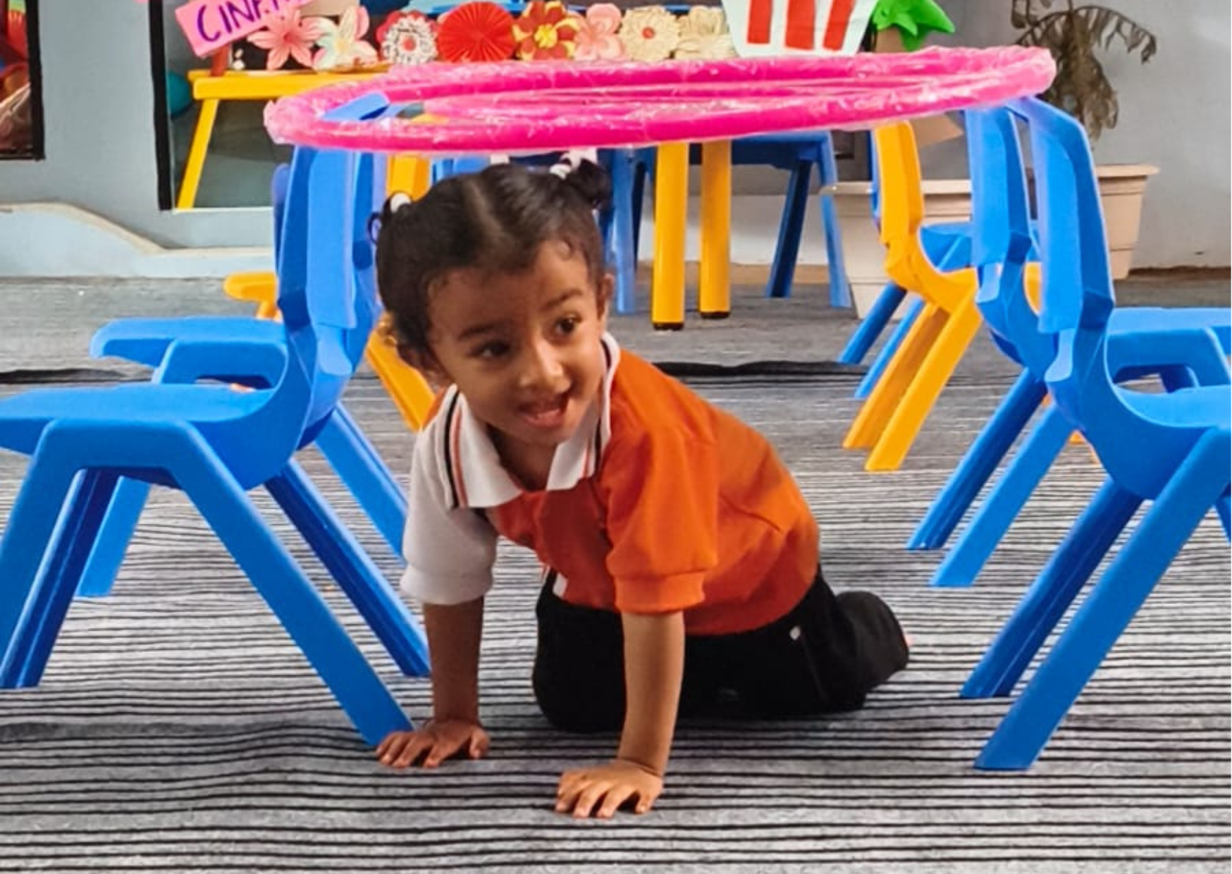 student is playing in the campus of seemant public school