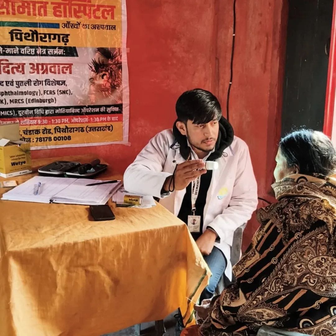 Doctor conducting eye checkup for elderly patient during Seemant eye camp in Uttarakhand
