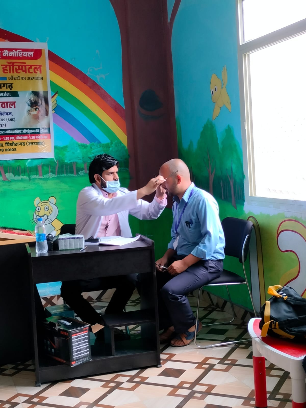 Women receiving eye screening during Seemant Sewa Foundation vision care camp