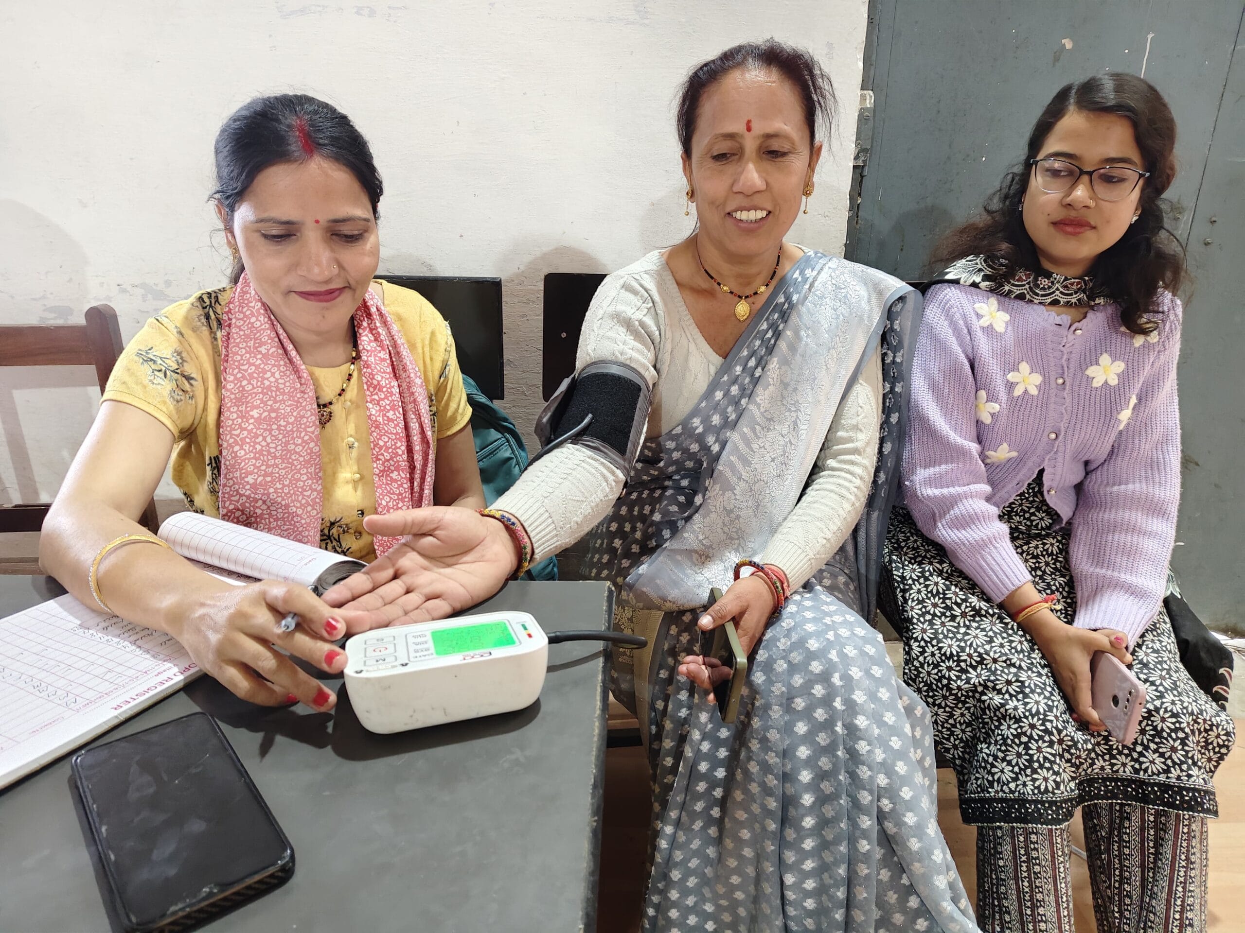 Blood pressure checkup during Seemant Sewa Foundation healthcare camp