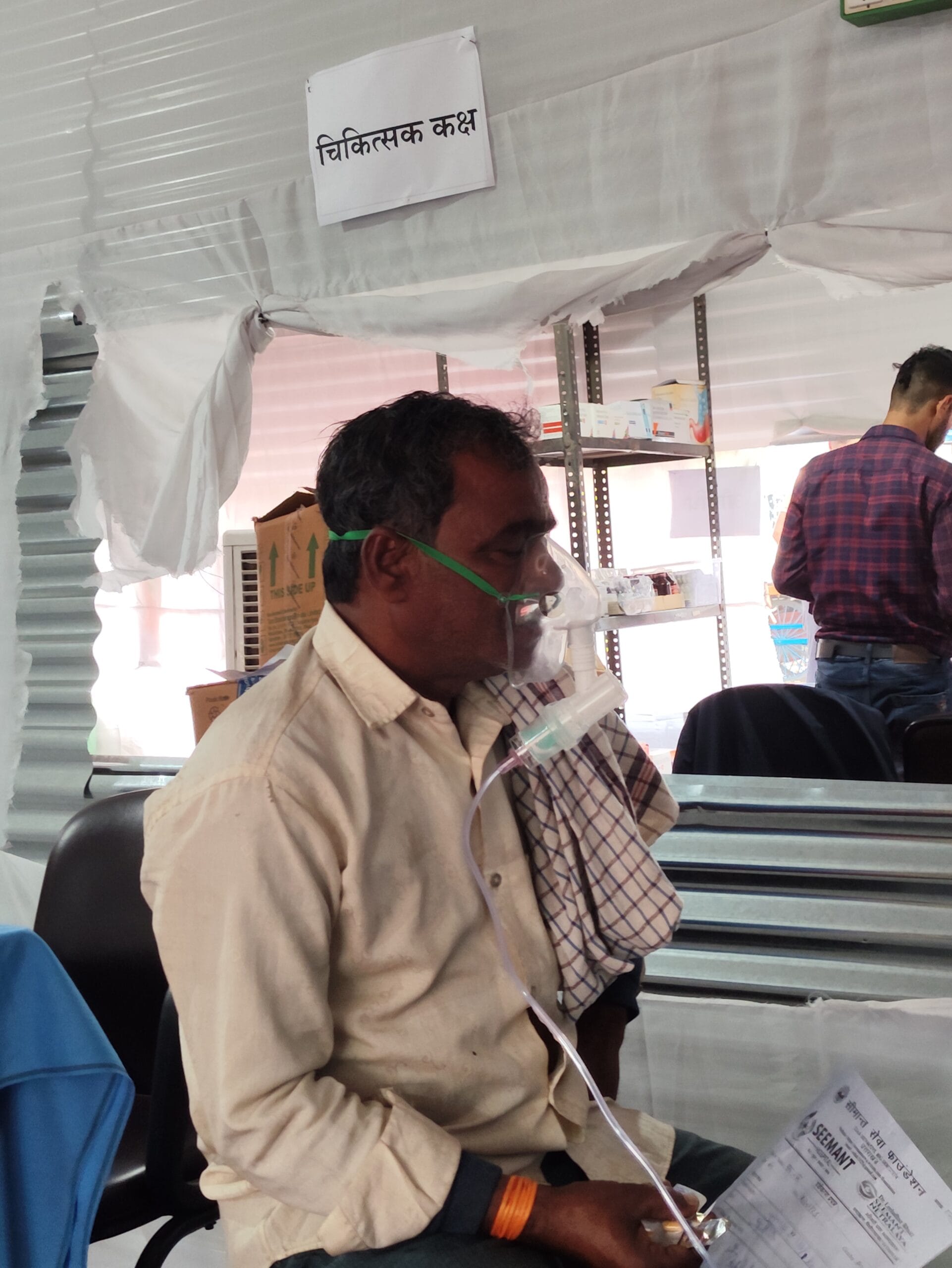 Patient receiving nebuliser treatment at Maa Purnagiri Nishulk Chikitsa Shivir 2025