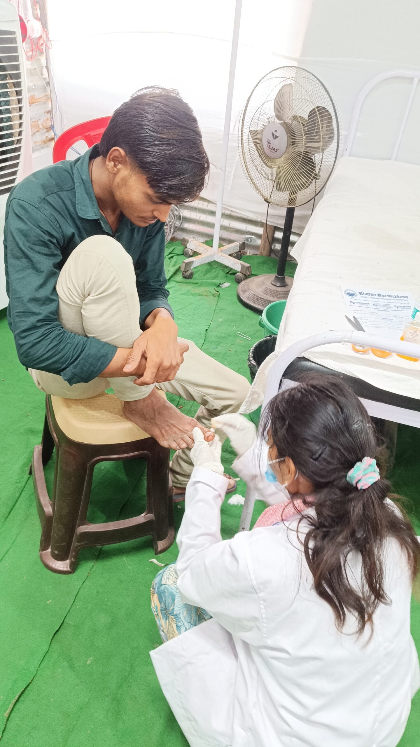 Medical dressing support for injured pilgrims during Maa Purnagiri healthcare camp
