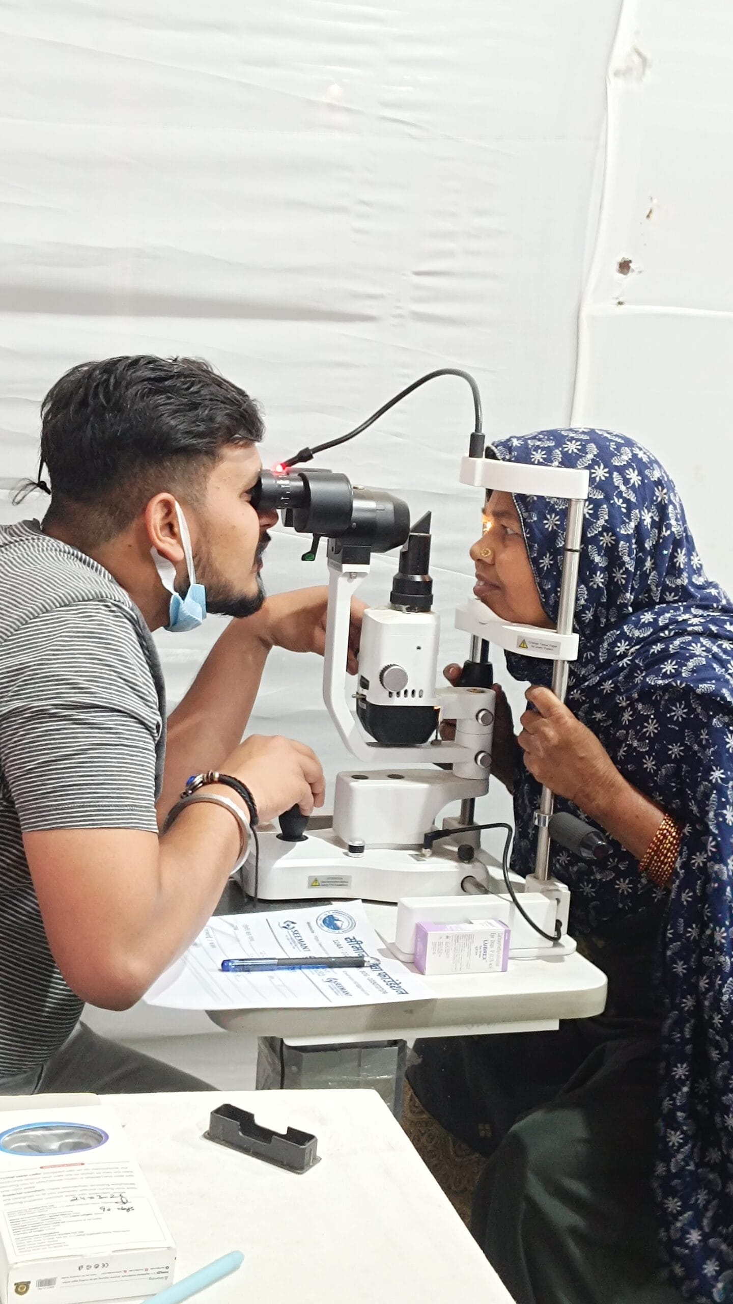 Doctors conducting free eye checkup during Maa Purnagiri Medical Camp 2026 in Uttarakhand