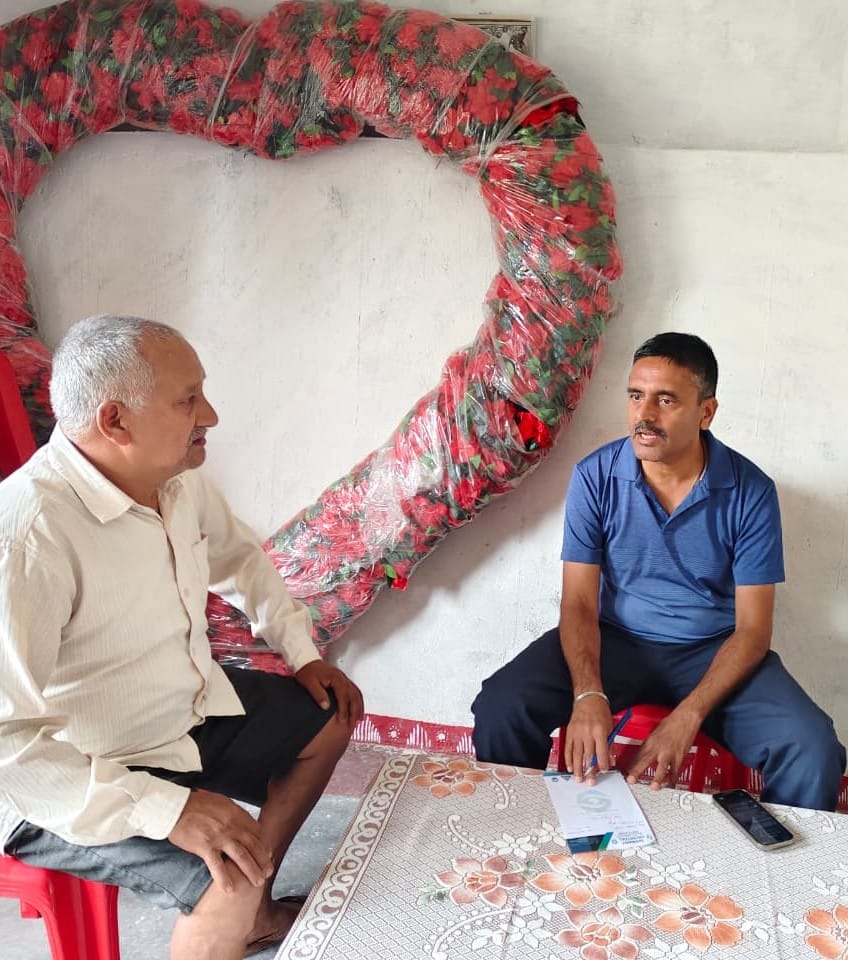 Doctors providing medical consultation during multi-speciality healthcare camp in Pithoragarh villages